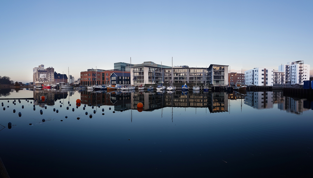 Reflection,Of,Buildings,In,The,Water,At,Port,Of,Odense V Dánsku budú mať nové múzeum H. C. Andersana. Má pripomínať živú rozprávku