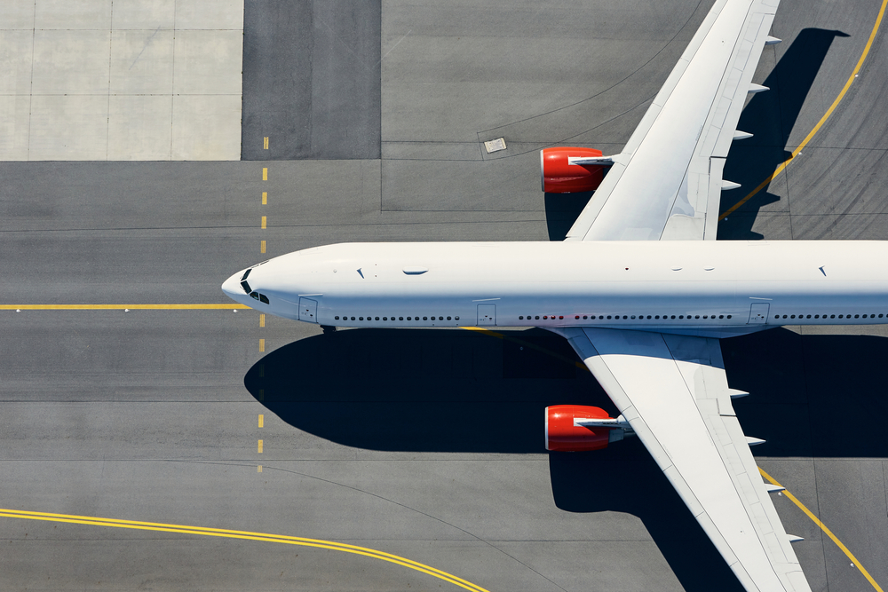 Aerial,View,Of,Airport.,Airplane,Taxiing,To,Runway,Before,Take Letný letový poriadok: na aké destinácie sa môžeme tešiť tento rok? (prehľad domácich aj neďalekých letísk)